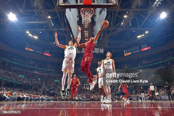 Craig Porter Jr. #9 of the Cleveland Cavaliers shoots the ball during the game against the Utah Jazz on December 20, 2023 at Rocket Mortgage...