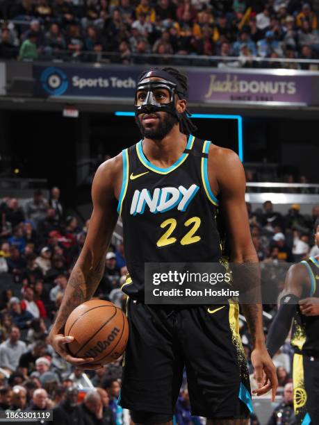 Isaiah Jackson of the Indiana Pacers prepares to shoot a free throw during the game against the Charlotte Hornets on December 20, 2023 at Gainbridge...
