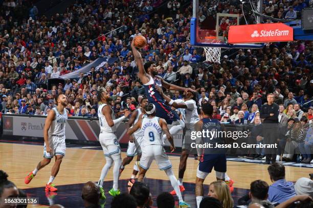 Joel Embiid of the Philadelphia 76ers drives to the basket during the game against the Minnesota Timberwolves on December 20, 2023 at the Wells Fargo...