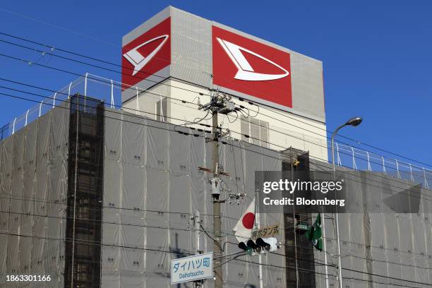 The Daihatsu Motor Co. Signage atop its headquarters in Ikeda, Osaka Prefecture, Japan, on Thursday, Dec. 21, 2023. Daihatsu Motor offices were...