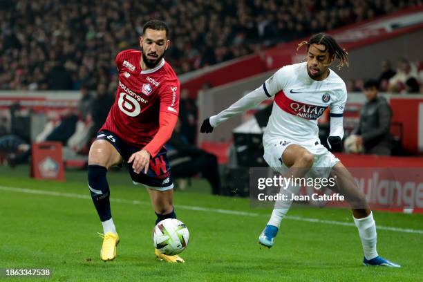 Nabil Bentaleb of Lille, Bradley Barcola of PSG in action during the Ligue 1 Uber Eats match between Lille OSC and Paris Saint-Germain at Stade...