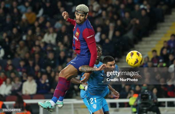 Ronald Araujo and Chumi are playing in the match between FC Barcelona and UD Almeria for week 18 of LaLiga EA Sports at the Olympic Stadium Lluis...