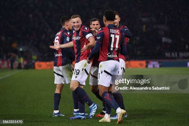 Dan Ndoye of Bologna FC celebrates with teammates during the Serie A TIM match between Bologna FC and AS Roma at Stadio Renato Dall'Ara on December...