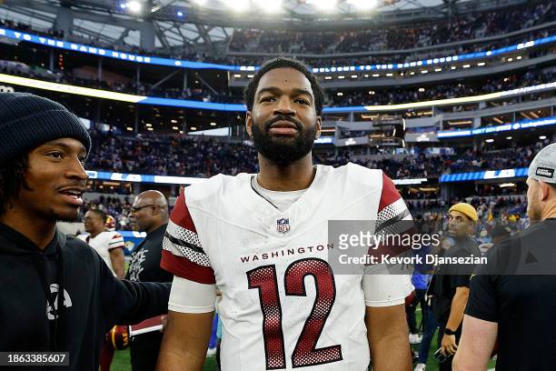 Jacoby Brissett of the Washington Commanders reacts after the game against the Los Angeles Rams at SoFi Stadium on December 17, 2023 in Inglewood,...