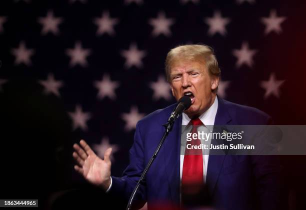 Republican Presidential candidate former U.S. President Donald Trump delivers remarks during a campaign rally at the Reno-Sparks Convention Center on...