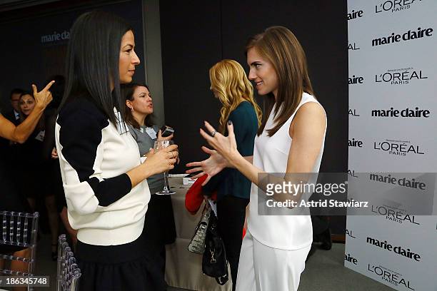 Fashion designer Rebecca Minkoff and actress Allison Williams attend Marie Claire's Power Women Lunch Presented By L'Oreal Paris on October 30, 2013...