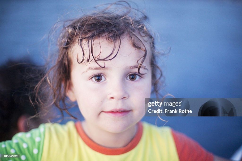 Portrait of a young kid with big brown eyes