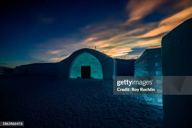 Phenomenon called Polar stratospheric clouds appears over Icehotel 34 on December 17, 2023 in Jukkasjarvi, Sweden. Since 1989, the Icehotel - part...