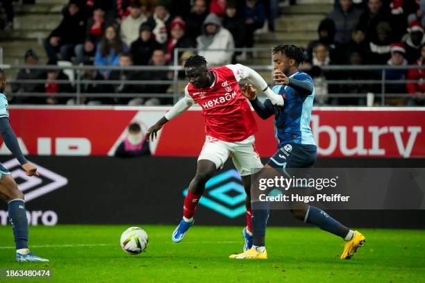 Oumar DIAKITE of Reims and Yoann SALMIER of Le Havre during the Ligue 1 Uber Eats match between Stade de Reims and Havre Athletic Club at Stade...