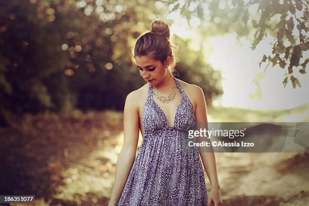 portrait of a woman in summer dress - neckline stock pictures, royalty-free photos & images