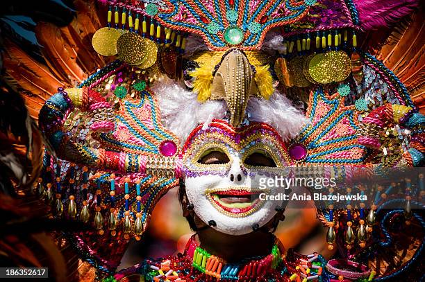 Mask of the Masskara Festival performer. MassKara Festival, one of the biggest and most colorful Filipino festivals, is held every year in October in...
