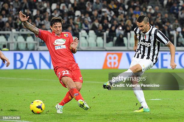 Leonardo Bonucci of Juventus scores a goal during the Serie A match between Juventus and Catania Calcio at Juventus Arena on October 30, 2013 in...