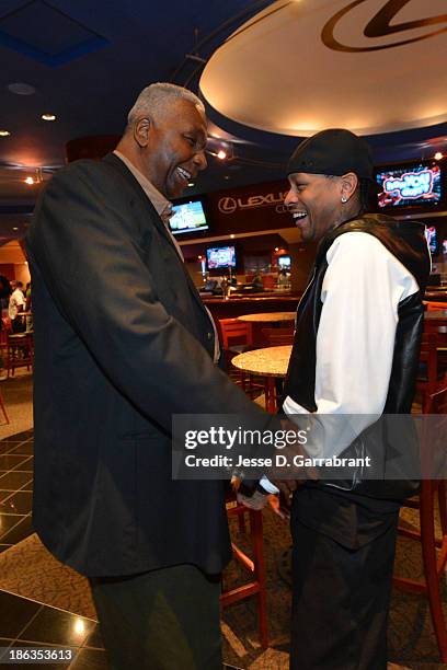 John Thompson, former Georgetown coach and former NBA player Allen Iverson pose for a picture during his retirement press conference at the Wells...