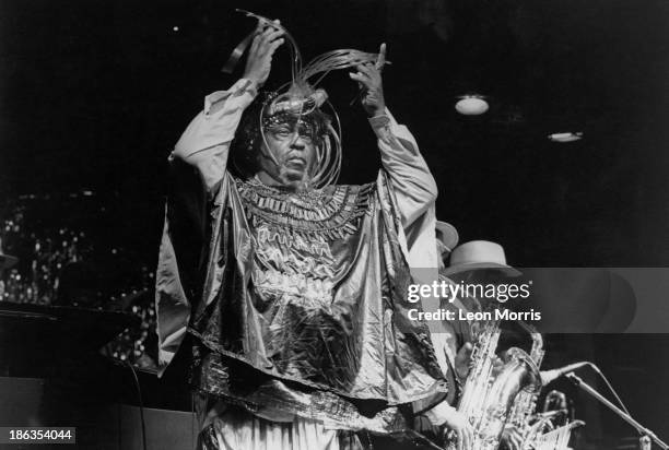 American jazz pianist, bandleader and composer Sun Ra performing with his Arkestra, circa 1985.