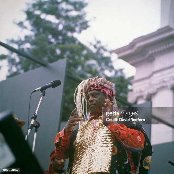 American jazz pianist, bandleader and composer Sun Ra performing with his Arkestra, 1987.