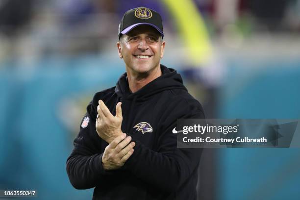 Head coach John Harbaugh of the Baltimore Ravens looks on before the game against the Jacksonville Jaguars at EverBank Stadium on December 17, 2023...