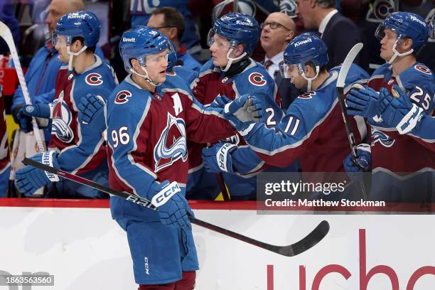 Mikko Rantanen of the Colorado Avalanche celebrates with his teammates after scoring against the San Jose Sharks in the first period at Ball Arena on...