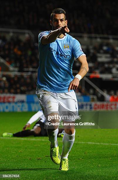 Álvaro Negredo of Manchester City celebrates scoring their first goal in extra time during the Capital One Cup Fourth Round match between Newcastle...