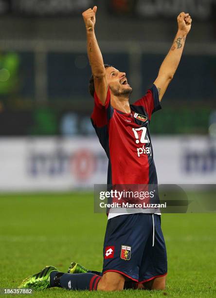 Luca Antonini of Genoa CFC of Parma FC celebrates a victory at the end of the Serie A match between Genoa CFC and Parma FC at Stadio Luigi Ferraris...