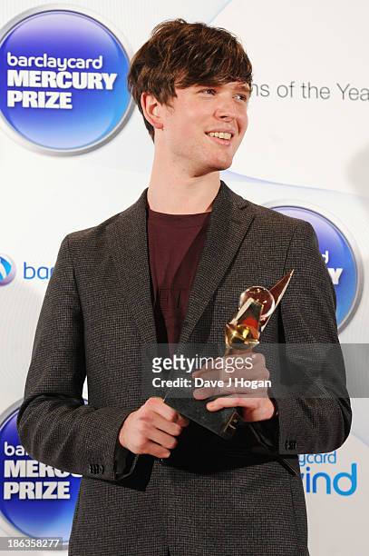 James Blake poses in front of the winners boards during the Barclaycard Mercury Prize 2013 at The Roundhouse on October 30, 2013 in London, England.