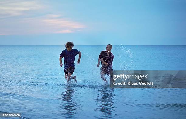 Chasing Guys 6,825 Friends Chasing Each Other Stock Photos, High-Res Pictures, and ...