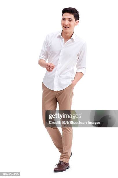 portrait of happy young man - portrait white background looking away stockfoto's en -beelden