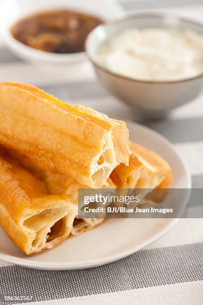 chinese food youtiao and tofu jelly - youtiao stock pictures, royalty-free photos & images