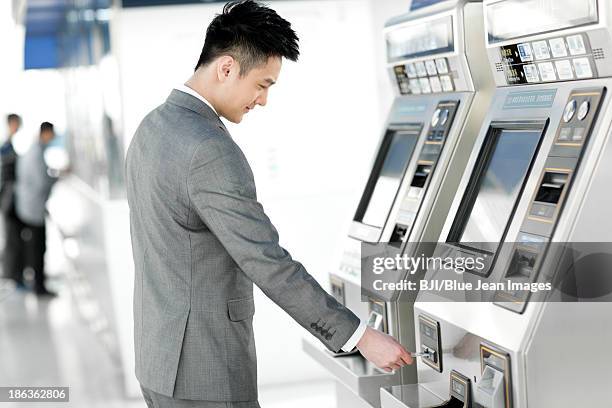 Ticket Machine Using Train Ticket Machine Photos and Premium High Res Pictures - Getty Images