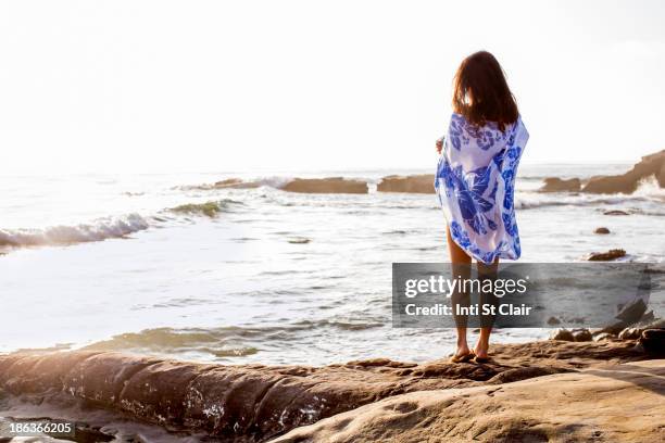 japanese woman standing on beach - sarong stock pictures, royalty-free photos & images