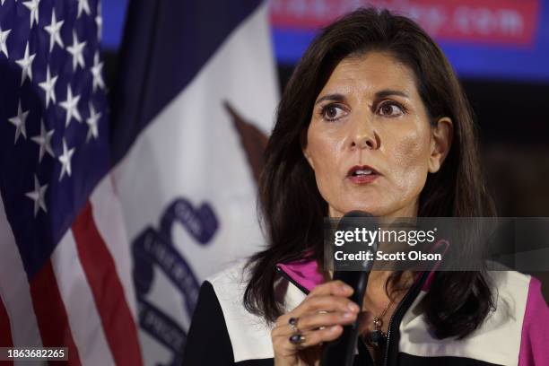 Republican presidential candidate former U.N. Ambassador Nikki Haley speaks to guests during a campaign stop at the Fireside Grille on December 17,...