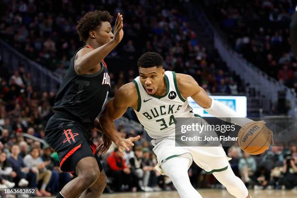 Giannis Antetokounmpo of the Milwaukee Bucks drives to the basket during the first half of the game against the Houston Rockets at Fiserv Forum on...