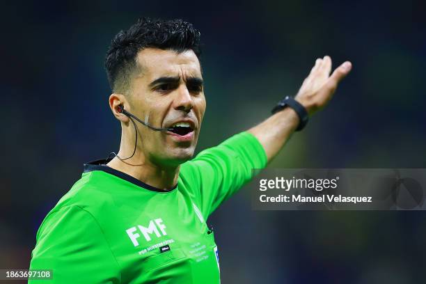 Referee Adonai Escobedo gestures during the final second leg match between America and Tigres UANL as part of the Torneo Apertura 2023 Liga MX at...