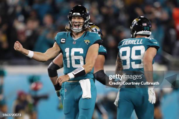 Trevor Lawrence of the Jacksonville Jaguars celebrates after his touchdown pass against the Baltimore Ravens during the third quarter at EverBank...