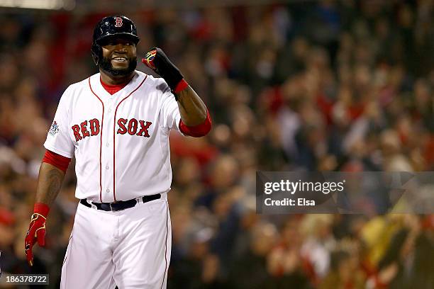 David Ortiz of the Boston Red Sox celebrates after scoring in the third inning against the St. Louis Cardinals during Game Six of the 2013 World...