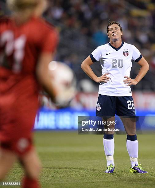 Abby Wambach of the US WomenÕs National Team looks at goalkeeper Erin Nayler of the New Zealand WomenÕs National Team in disbelief after Nayler...