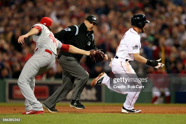 Jacoby Ellsbury of the Boston Red Sox gets out of a rundown in the fifth inning against the St. Louis Cardinals during Game Six of the 2013 World...