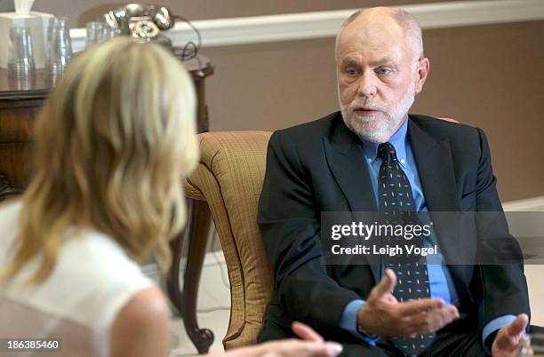 Actor Robert David Hall from CBS-TV's CSI: Crime Scene Investigation speaks with Adrianne Haslet-Davis, Boston Marathon bombing survivor and amputee,...