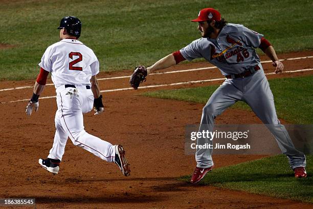 Jacoby Ellsbury of the Boston Red Sox avoids a tag by Kevin Siegrist of the St. Louis Cardinals in the fifth inning during Game Six of the 2013 World...