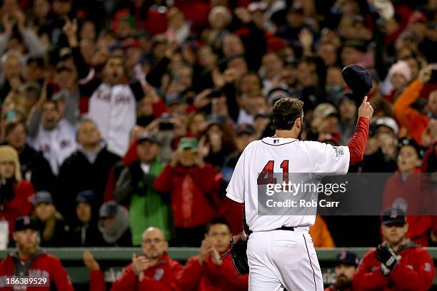 John Lackey of the Boston Red Sox tips his cap after being pulled in the seventh inning against the St. Louis Cardinals during Game Six of the 2013...