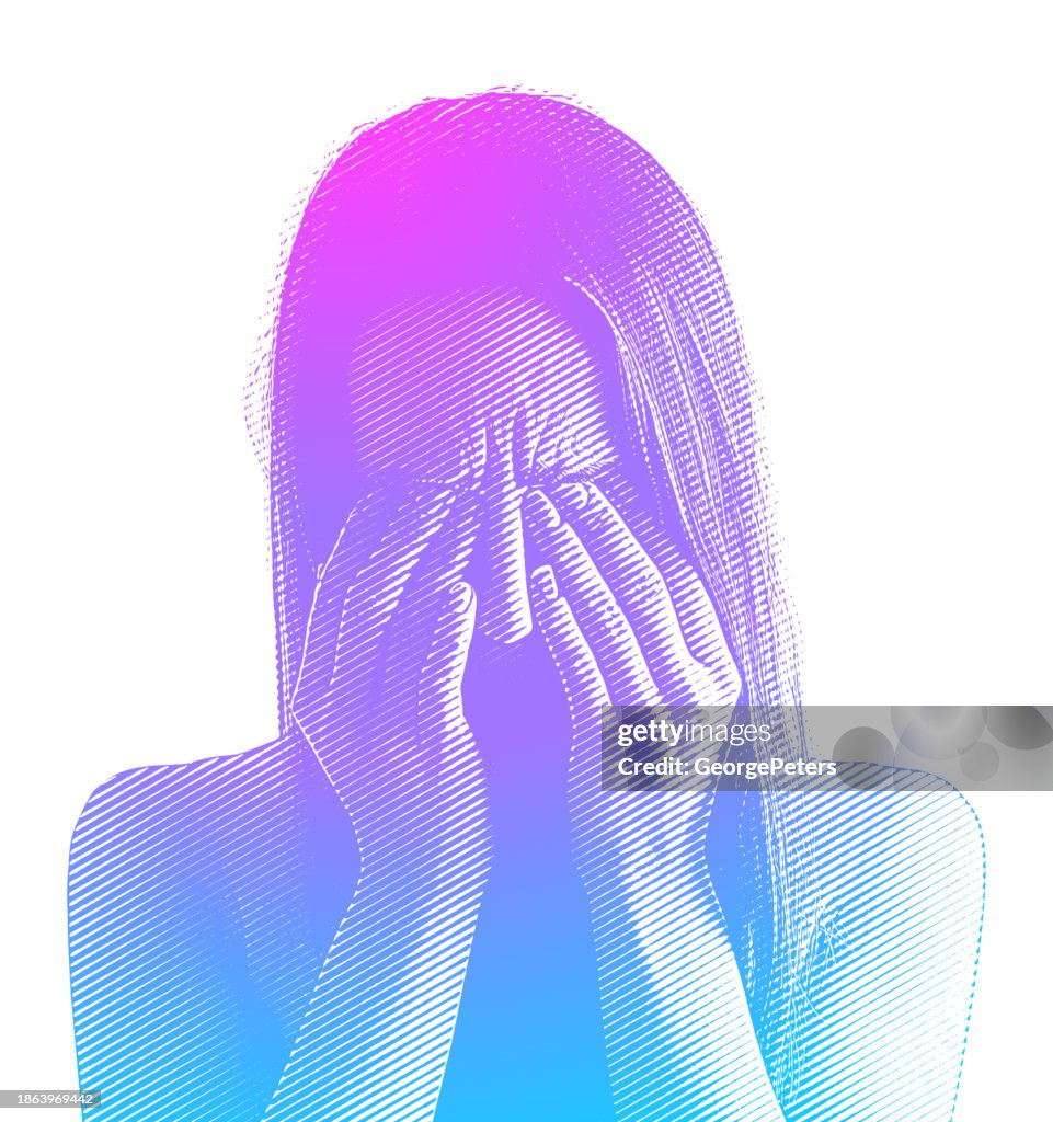Stressed out woman covering face in hands