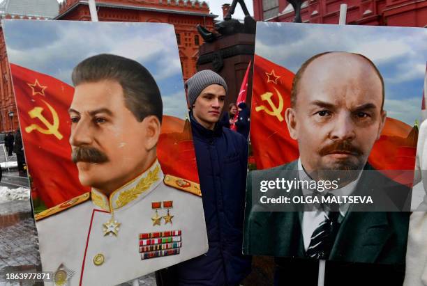 Russian Communist party supporters gather to lay flowers to the tomb of late Soviet leader Joseph Stalin to mark the 144th anniversary of his birth...