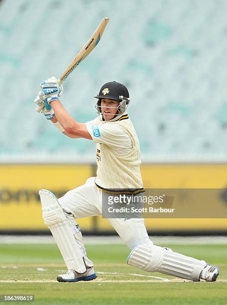 Marcus North of the Warriors bats during day two of the Sheffield Shield match between the Victoria Bushrangers and the Western Australia Warriors at...