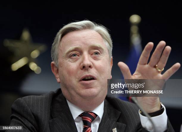 European Parliament President Pat Cox of Ireland gives a press conference at European headquarters in Brussels 18 June 2004 on the second day of...