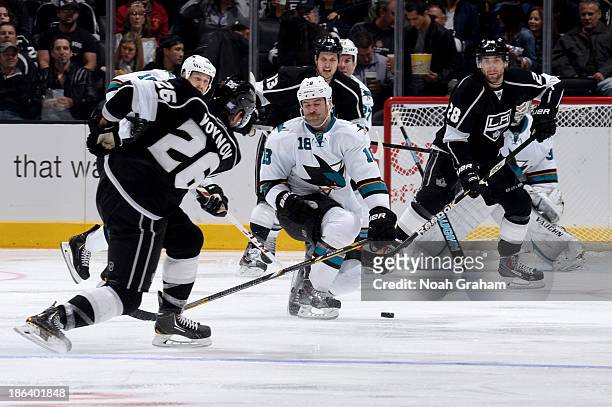 Salva Voynov of the Los Angeles Kings shoots the puck which resulted in a deflected goal by Jarret Stoll of the Kings against the San Jose Sharks at...