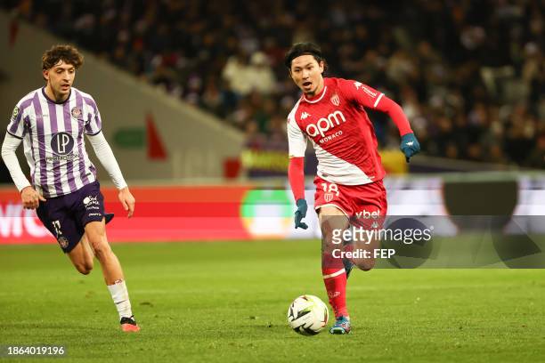 Takumi MINAMINO of Monaco and Cesar GELABERT of Toulouse during the Ligue 1 Uber Eats match between Toulouse Football Club and Association Sportive...