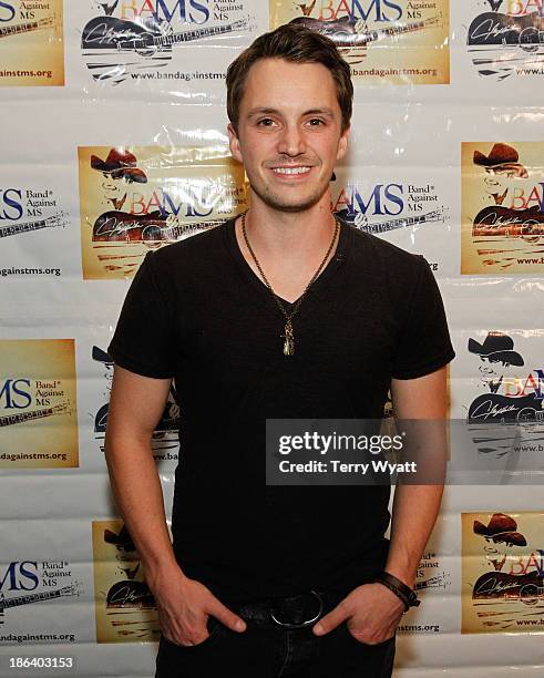 Recording artist Greg Bates backstage during the 4th annual Chords of Hope benefit concert at Wildhorse Saloon on October 30, 2013 in Nashville,...