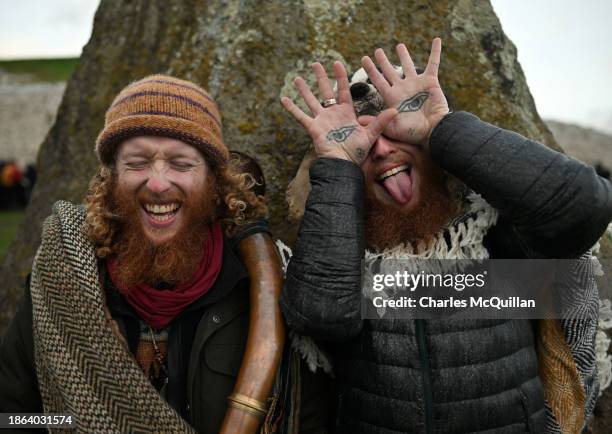 Twins Dean and Keith Stapleton react as they watch the sun rise during the Winter Solstice at Newgrange on December 21, 2023 in Newgrange, Ireland....