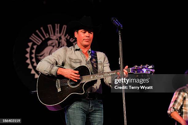 Recording artist Clay Walker performs during the 4th annual Chords of Hope benefit concert at Wildhorse Saloon on October 30, 2013 in Nashville,...