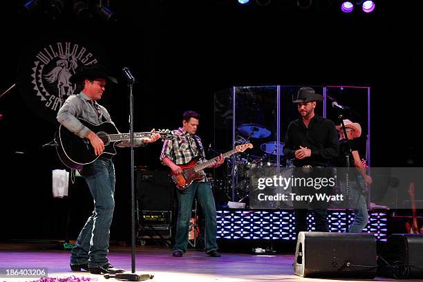 Clay Walker performs with Craig Campbell during the 4th annual Chords of Hope benefit concert at Wildhorse Saloon on October 30, 2013 in Nashville,...