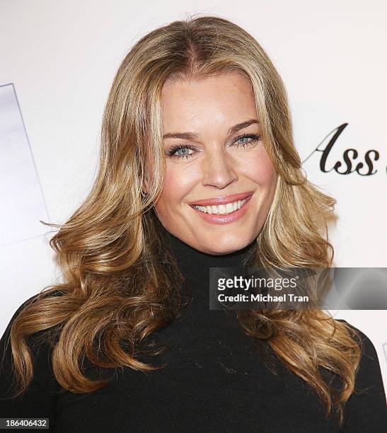 Rebecca Romijn arrives at the Los Angeles premiere of "Ass Backwards" held at the Vista Theatre on October 30, 2013 in Los Angeles, California.
